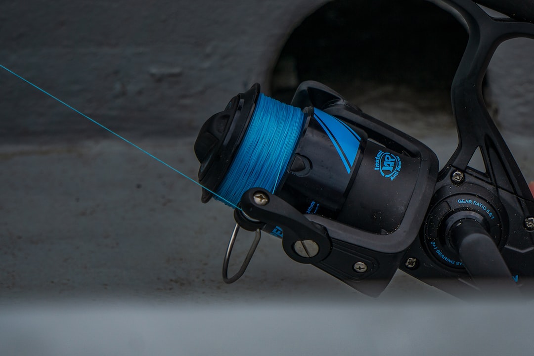 fishing reel with blue fishing line